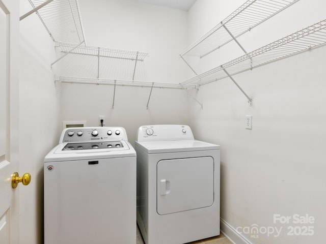 laundry area with washer and dryer and laundry area