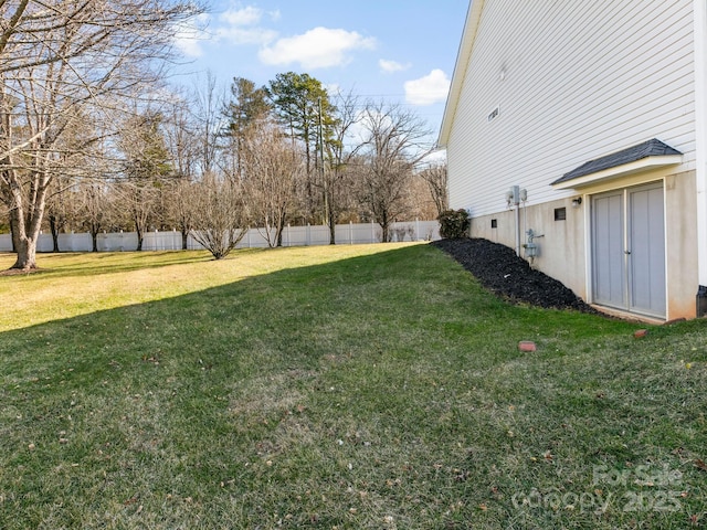 view of yard with fence