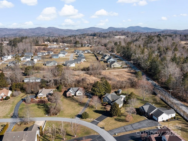 birds eye view of property featuring a residential view and a mountain view