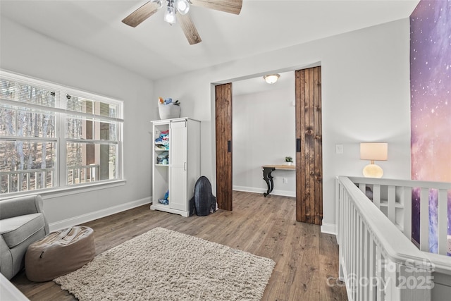 13701 Petworth Ct, Charlotte, NC 28278 - bedroom featuring wood finished floors, baseboards, and a ceiling fan