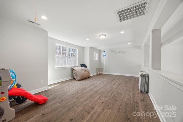 13701 Petworth Ct, Charlotte, NC 28278 - workout area with wood finished floors, recessed lighting, and baseboards