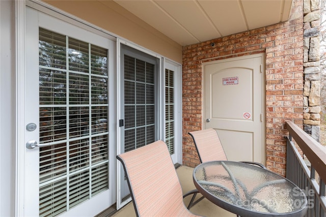 balcony with outdoor dining area