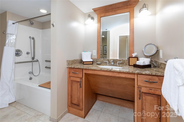 bathroom with shower / bath combo, vanity, and tile patterned floors