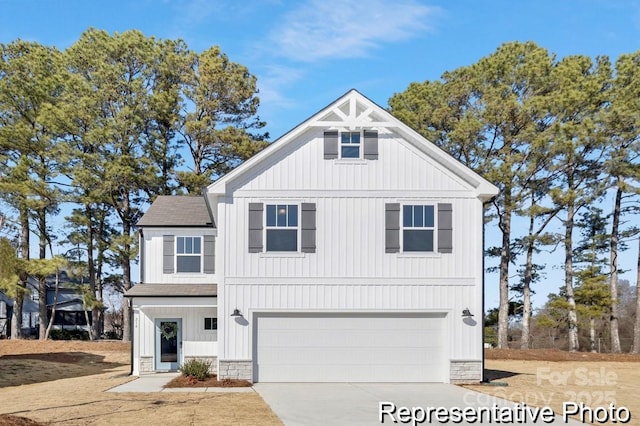 modern inspired farmhouse featuring a garage, concrete driveway, stone siding, roof with shingles, and board and batten siding