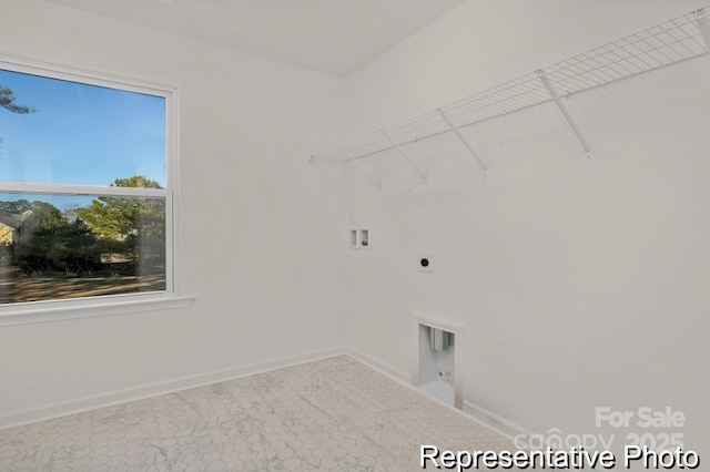 laundry room featuring baseboards, laundry area, washer hookup, and hookup for an electric dryer