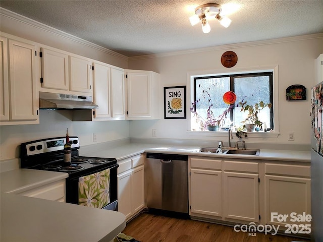 kitchen with light countertops, electric range, a sink, dishwasher, and under cabinet range hood