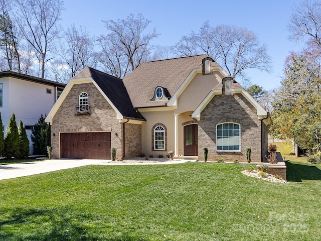 view of front of house featuring concrete driveway, brick siding, a front lawn, and stucco siding