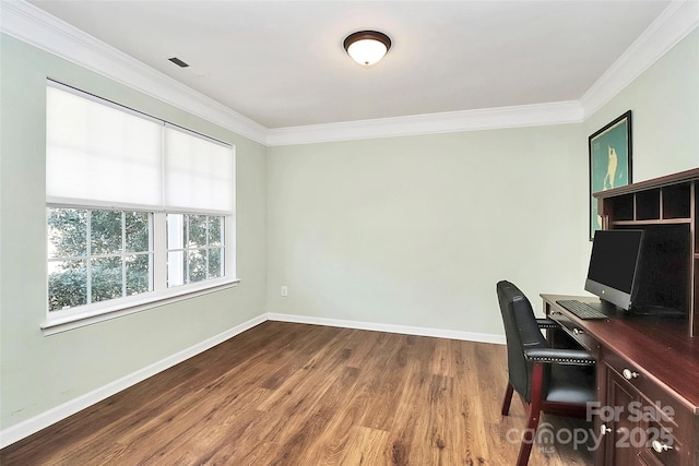 office featuring crown molding, baseboards, and wood finished floors