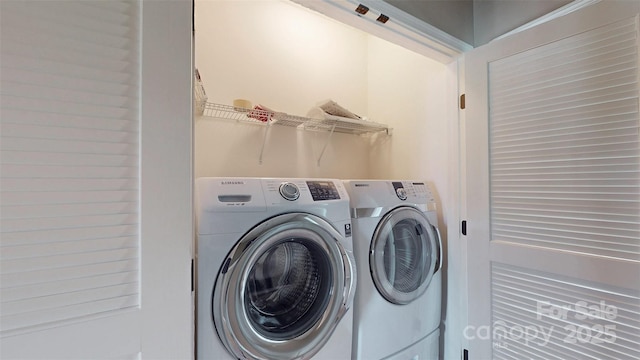 laundry room with laundry area and independent washer and dryer