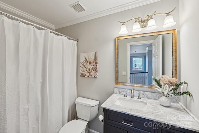 bathroom featuring toilet, visible vents, crown molding, and vanity