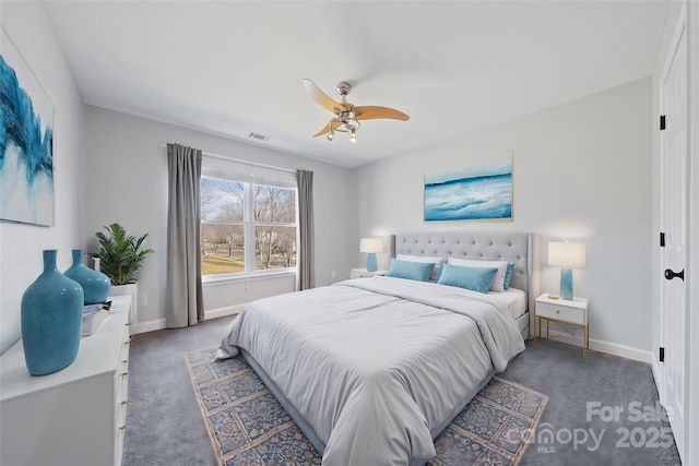 bedroom featuring ceiling fan, visible vents, baseboards, and carpet flooring