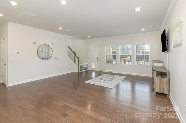 living room with stairway, dark wood finished floors, crown molding, and recessed lighting