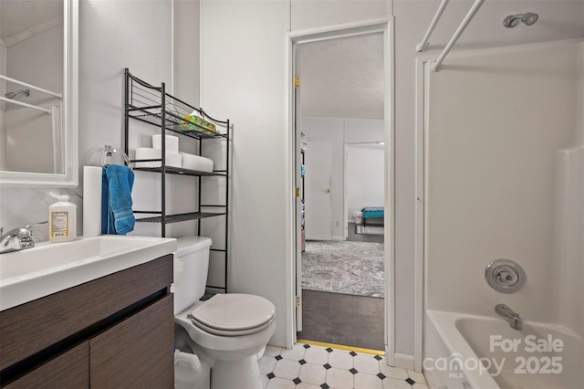 full bathroom with shower / bath combination, vanity, toilet, and tile patterned floors