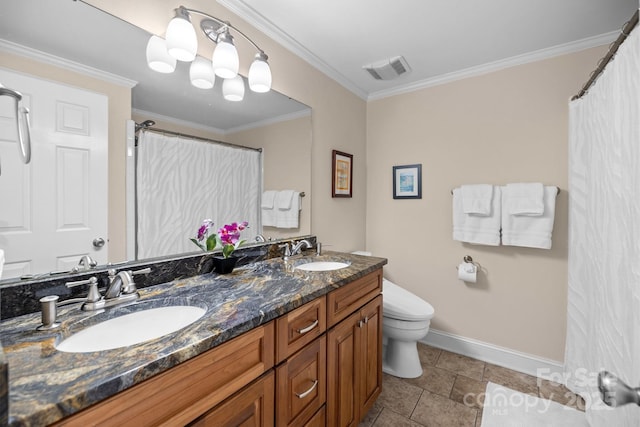 bathroom with baseboards, visible vents, ornamental molding, and a sink