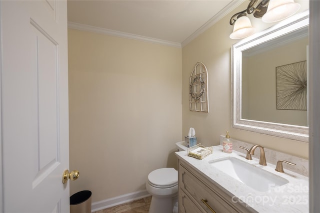 half bathroom with toilet, baseboards, ornamental molding, and vanity