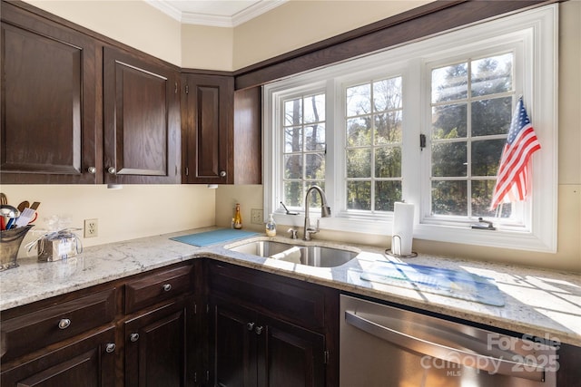 kitchen featuring dishwasher, ornamental molding, a sink, and dark brown cabinetry