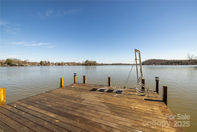 view of dock with a water view