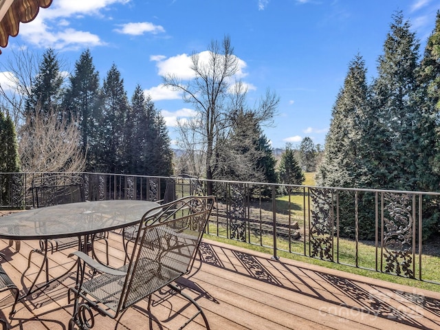 deck featuring outdoor dining space