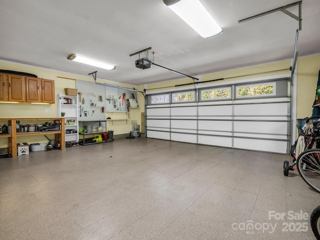 garage featuring a garage door opener