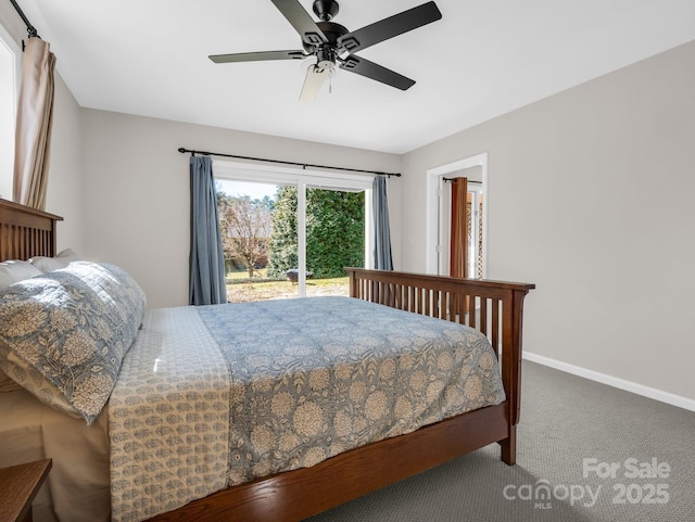 carpeted bedroom with ceiling fan and baseboards