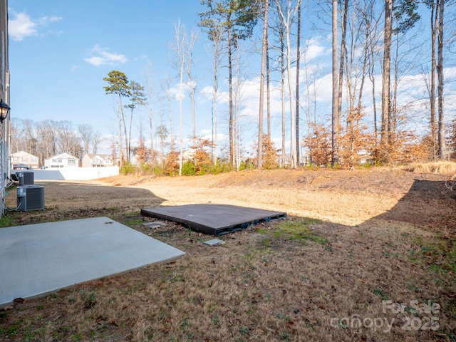 view of yard with a patio area and cooling unit