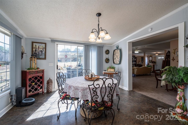 dining area with plenty of natural light and ornamental molding