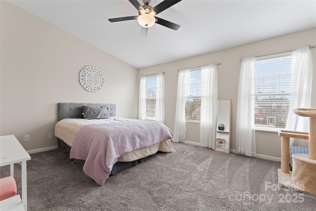 carpeted bedroom with baseboards, lofted ceiling, and ceiling fan