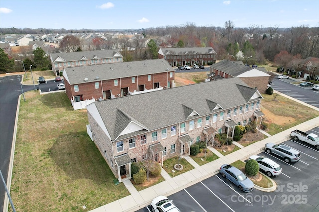 drone / aerial view with a residential view