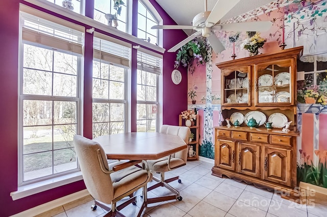 dining room featuring ceiling fan and light tile patterned floors