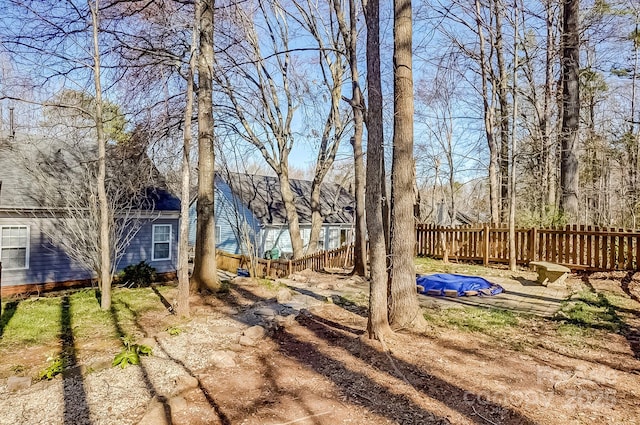 view of yard with fence