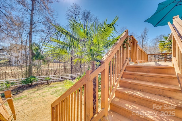 wooden deck with stairs and fence