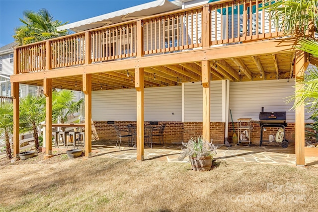 view of patio featuring a deck and grilling area