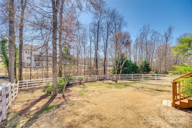 view of yard with fence