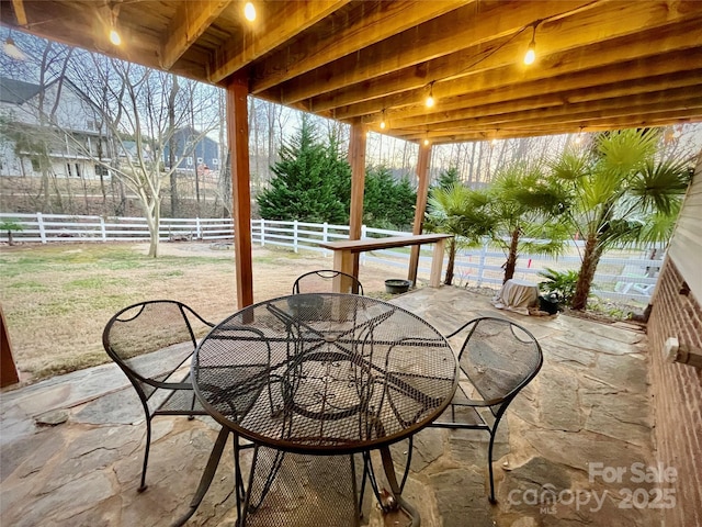 view of patio / terrace featuring fence private yard and outdoor dining area