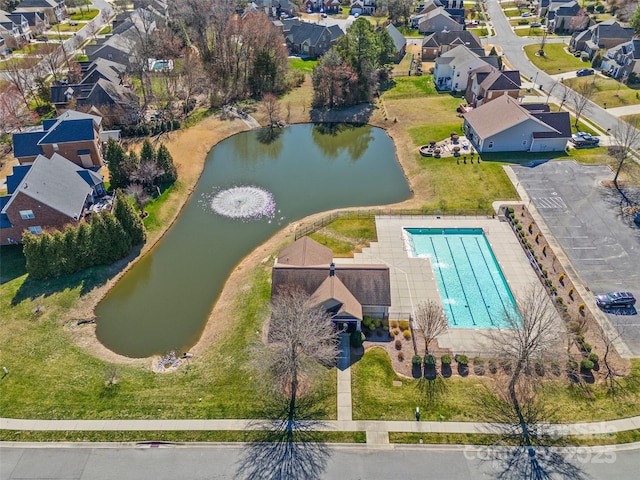 aerial view with a residential view and a water view