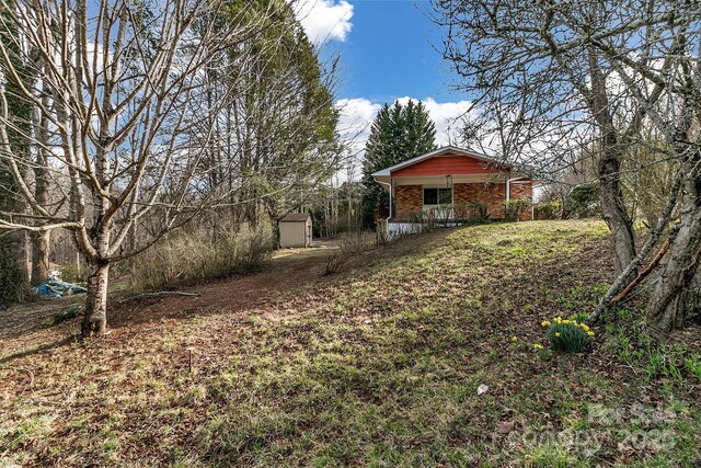 view of yard with a porch