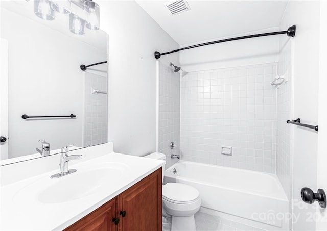 full bathroom featuring visible vents, vanity, toilet, and shower / bath combination