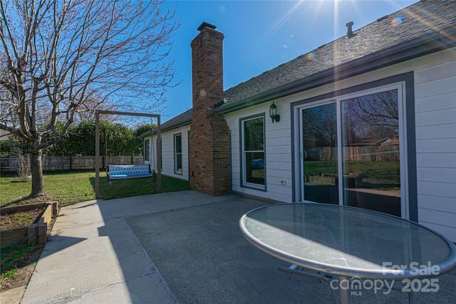 view of patio / terrace with fence