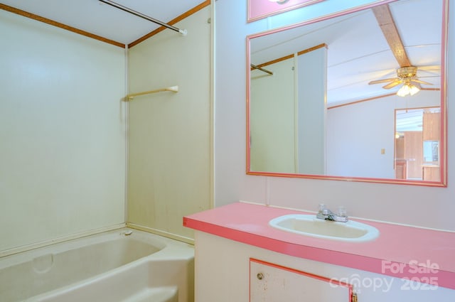 bathroom with a ceiling fan, bathing tub / shower combination, and vanity