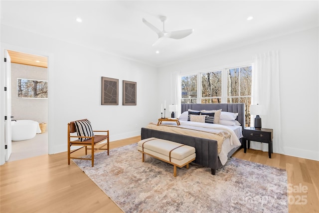 bedroom with light wood-style floors, recessed lighting, and baseboards