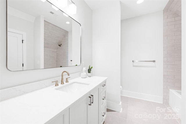 full bathroom with recessed lighting, toilet, vanity, baseboards, and tile patterned floors