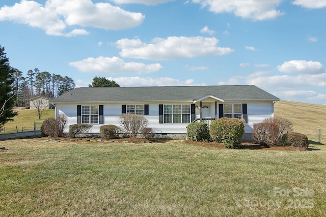 ranch-style home featuring crawl space, fence, and a front lawn