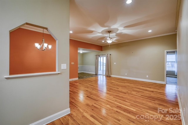 unfurnished room featuring light wood finished floors, recessed lighting, ornamental molding, baseboards, and ceiling fan with notable chandelier