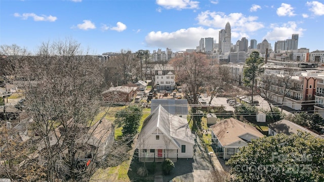 birds eye view of property featuring a view of city