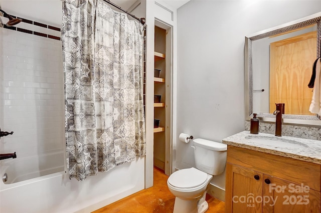 bathroom with shower / bathtub combination with curtain, toilet, and vanity