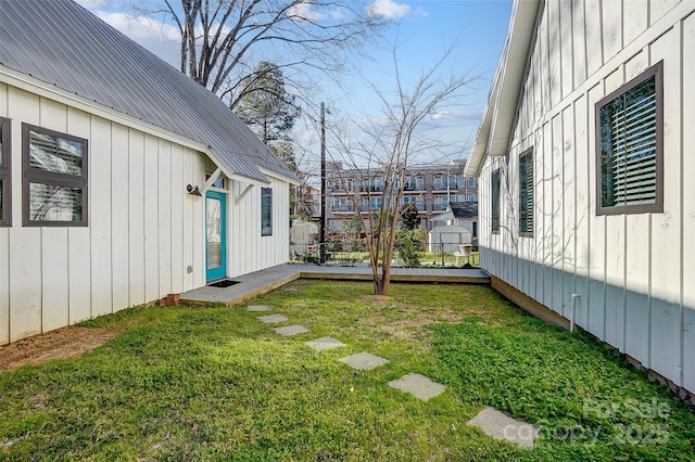 view of yard featuring a wooden deck