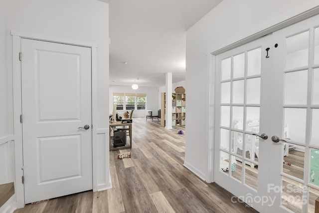 corridor with wood finished floors