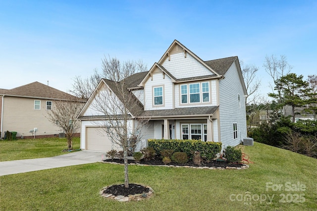 view of front of property featuring driveway, central air condition unit, a garage, and a front yard