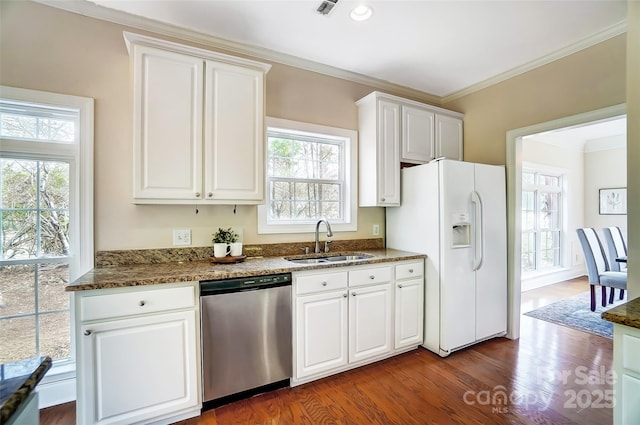 kitchen featuring ornamental molding, dark wood-type flooring, stainless steel dishwasher, white fridge with ice dispenser, and a sink