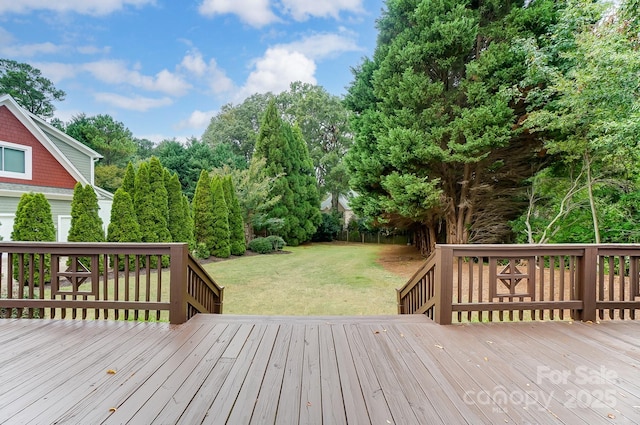 deck featuring a lawn